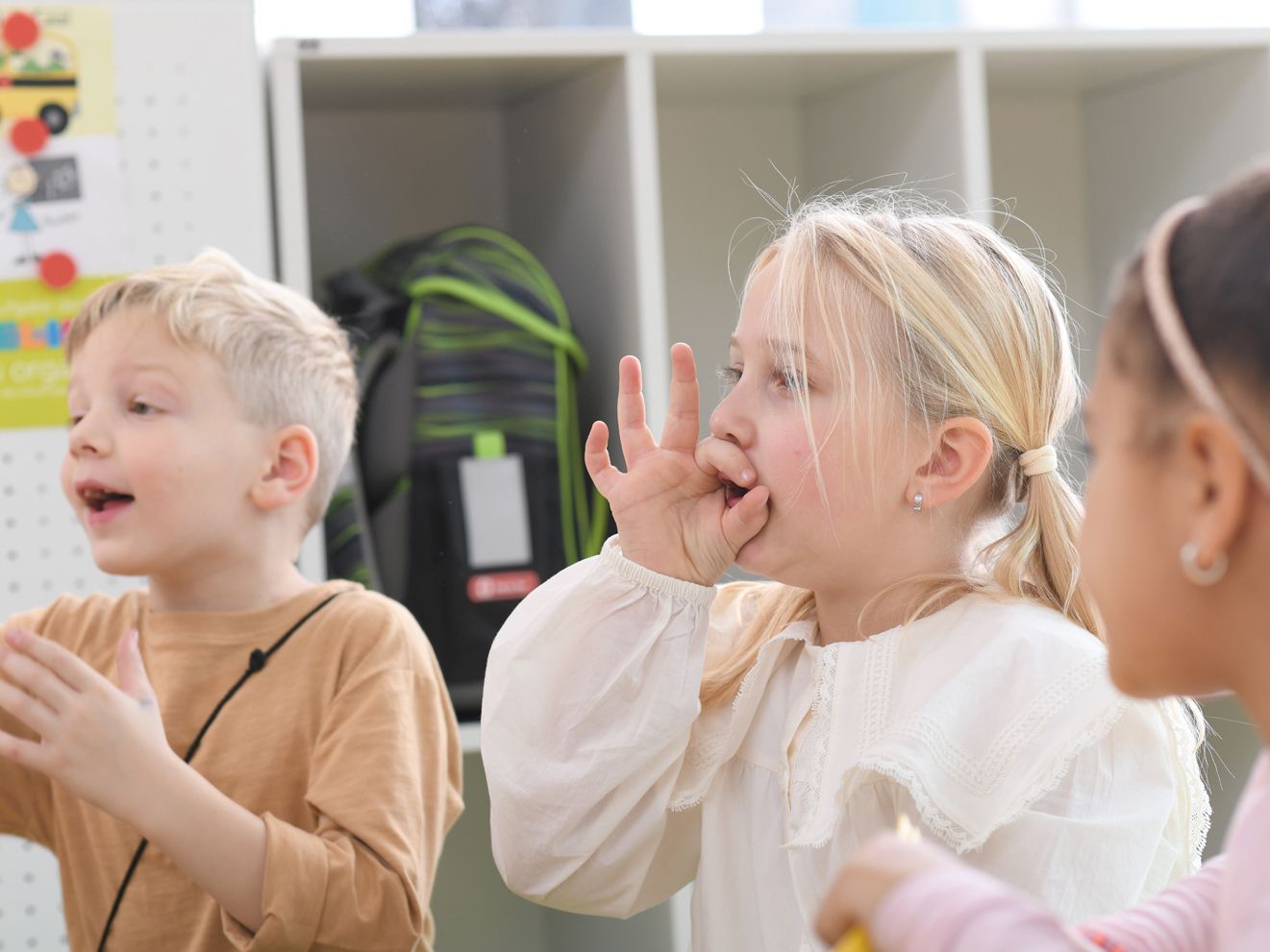 Young children learn with interactive exercises.