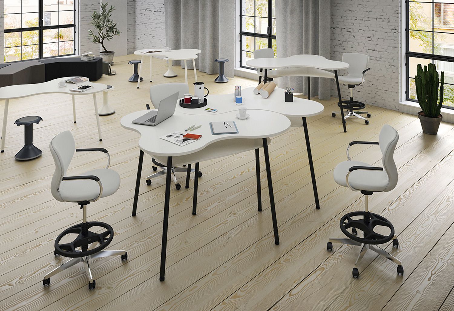 An open-plan work landscape with Puzzle standing and sitting tables, PantoMove upholstered office swivel chairs and Hokkis by VS