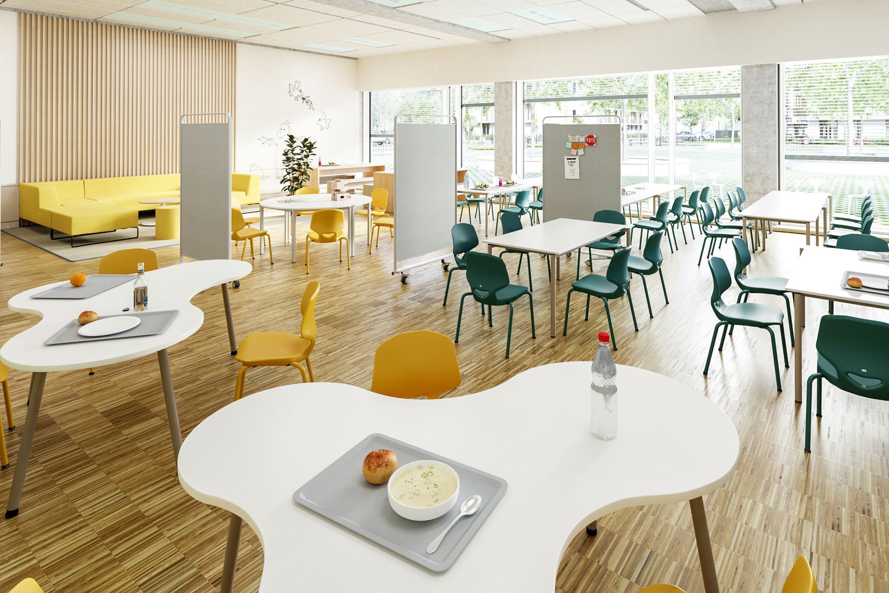 Cantine scolaire équipée de tables aux formes organiques, de chaises d'élèves jaunes et vertes, de canapés et de cloisons acoustiques mobiles de VS