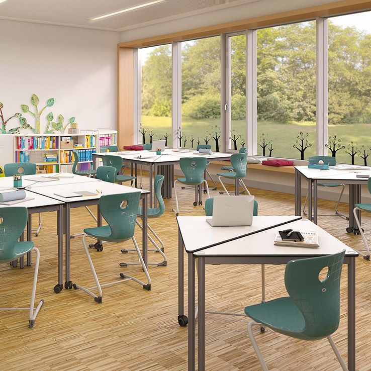 Classroom with turquoise PantoSwing student chairs by VS at group tables