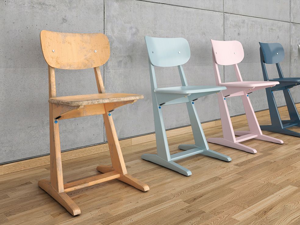 Wooden skid chairs of VS in different pastel colours next to each other