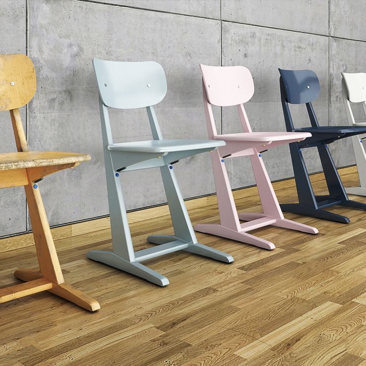 Wooden skid chairs of VS in different pastel colours next to each other