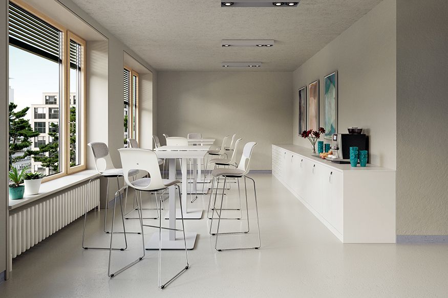 A break room with high tables and the tall wire frame chairs NF-Wire Plus by VS