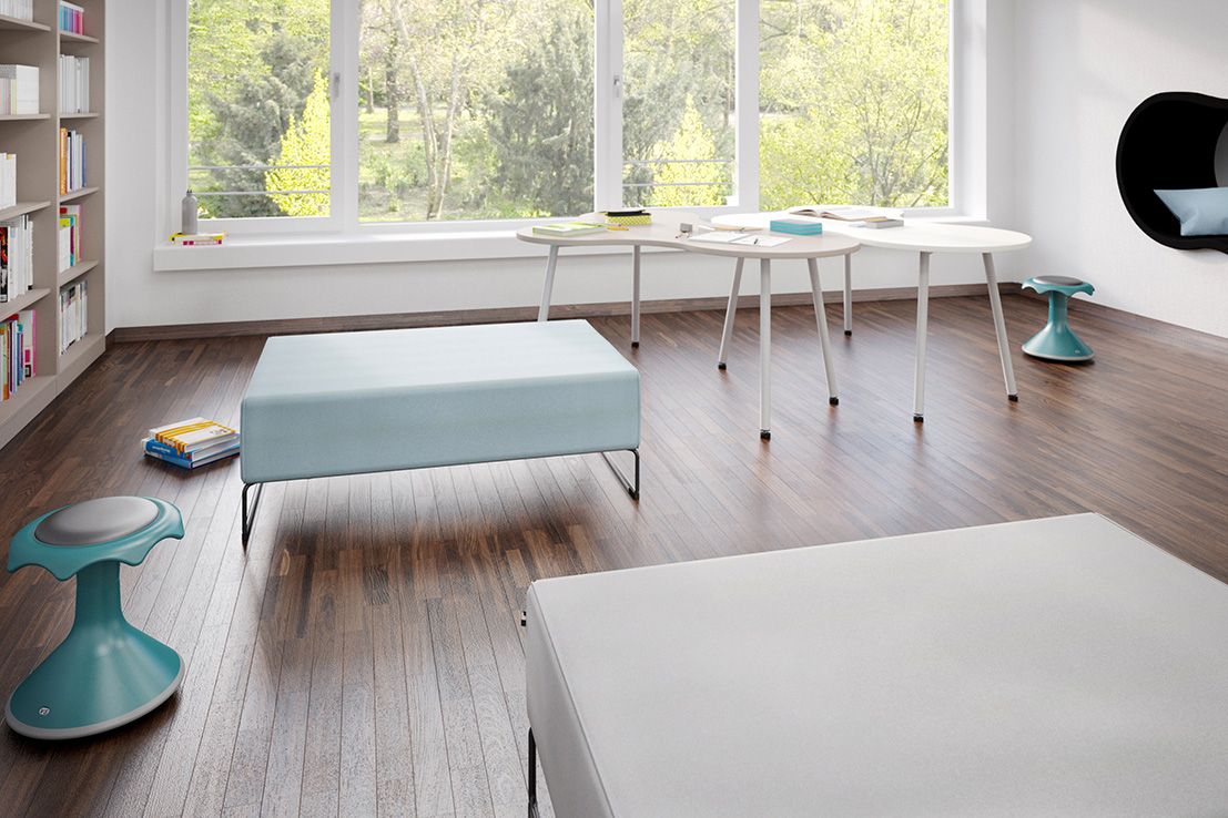 Chill-out area for secondary school students with VS puzzle tables and upholstered stools