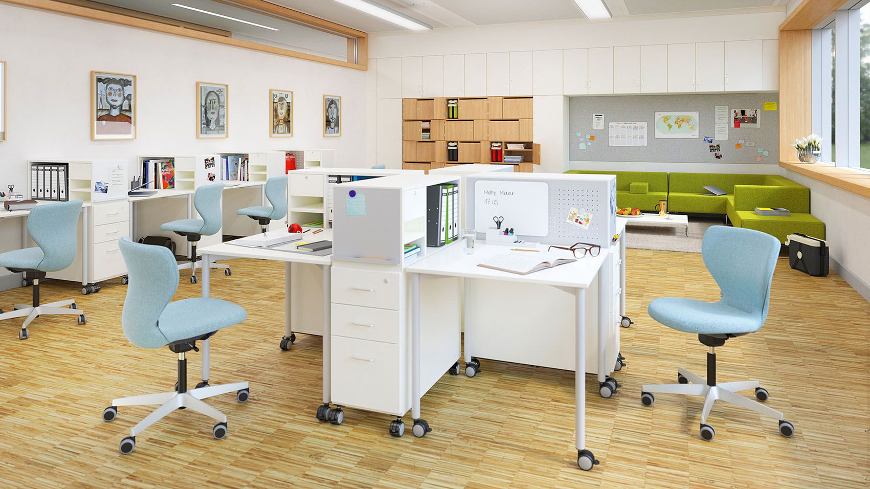 A teachers' room with individual desks and upholstered Panto swivel chairs as well as a seating area with a LowBack couch from the Lounge series by VS