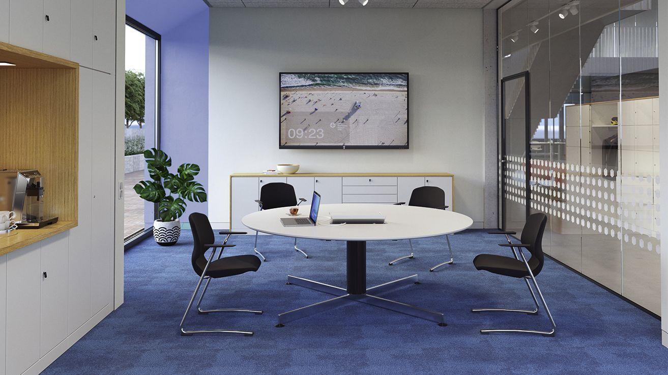 Meeting room with round meeting table Rondo and upholstered VS chairs JUMPER