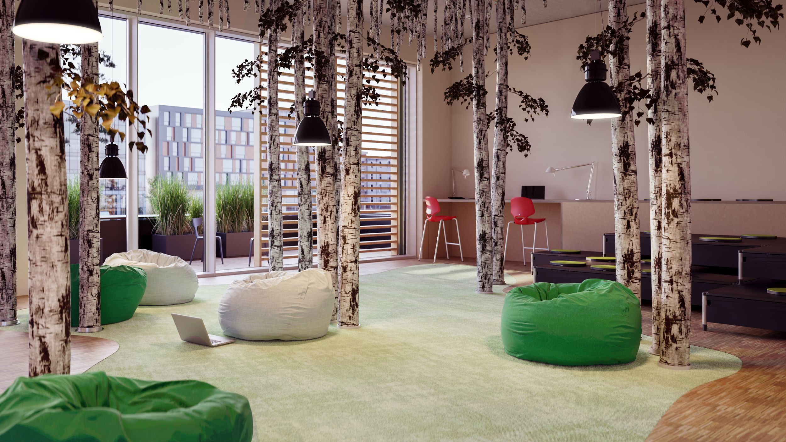 Relaxed lounge area with beanbags and birch tree trunks