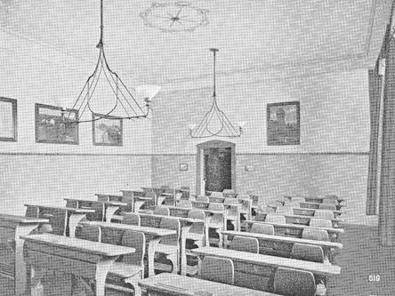 Black and white photograph of a classroom by Dr Maria Montessori