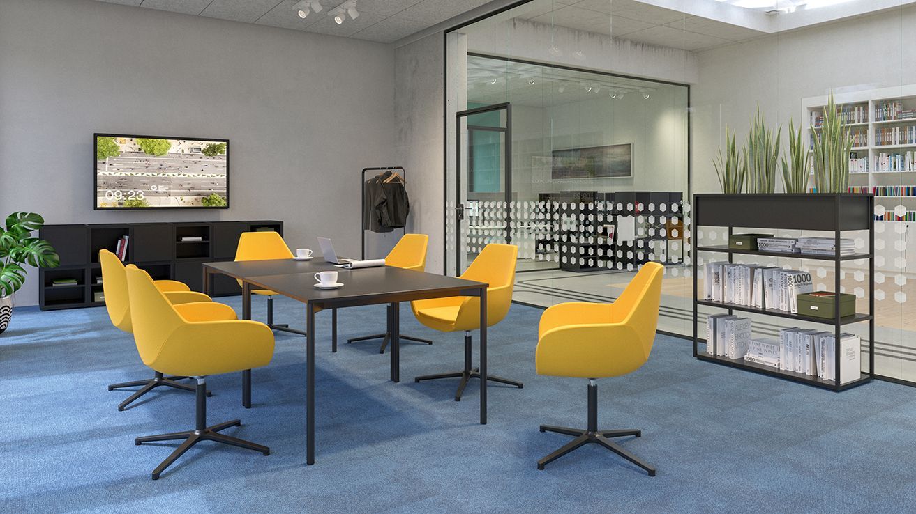 Yellow armchair Fan by VS in a meeting room