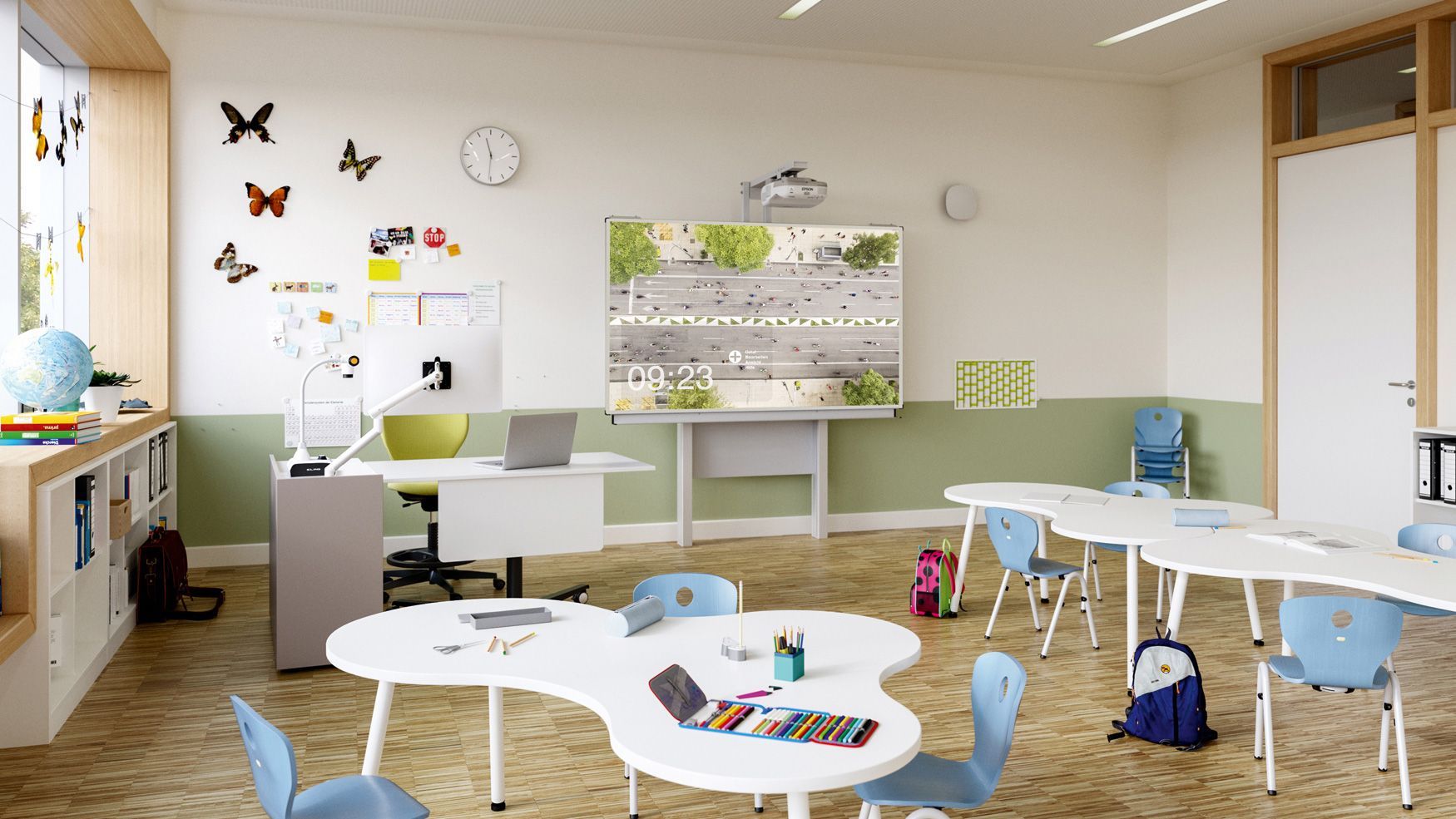 Une salle de classe d'école primaire avec des tables de forme libre Puzzle et le tableau interactif MediaPilon de VS