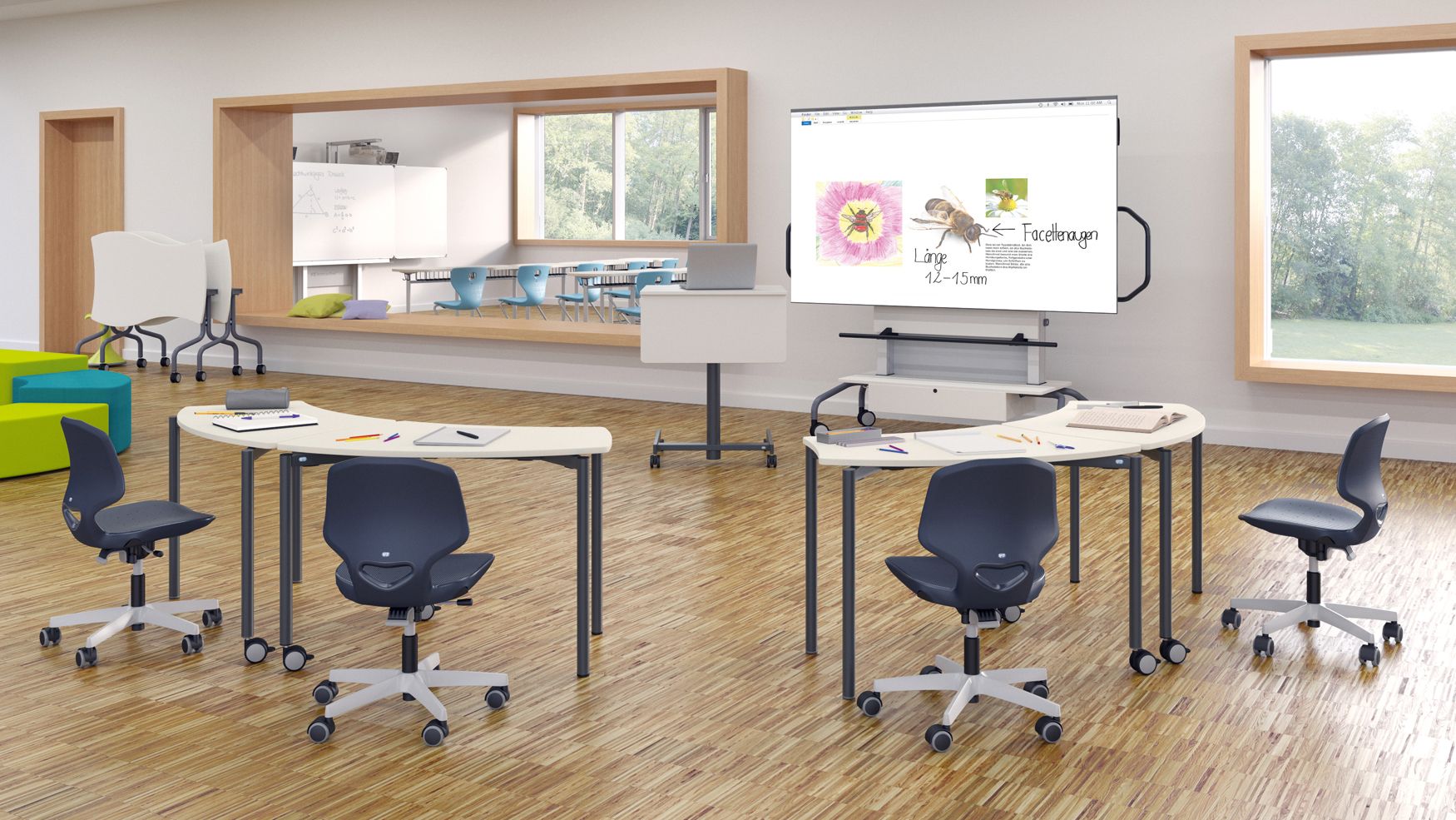 JUMPER Air Move student chairs at Shift+ student desks in front of a teacher's desk and an interactive whiteboard by VS in a primary school classroom