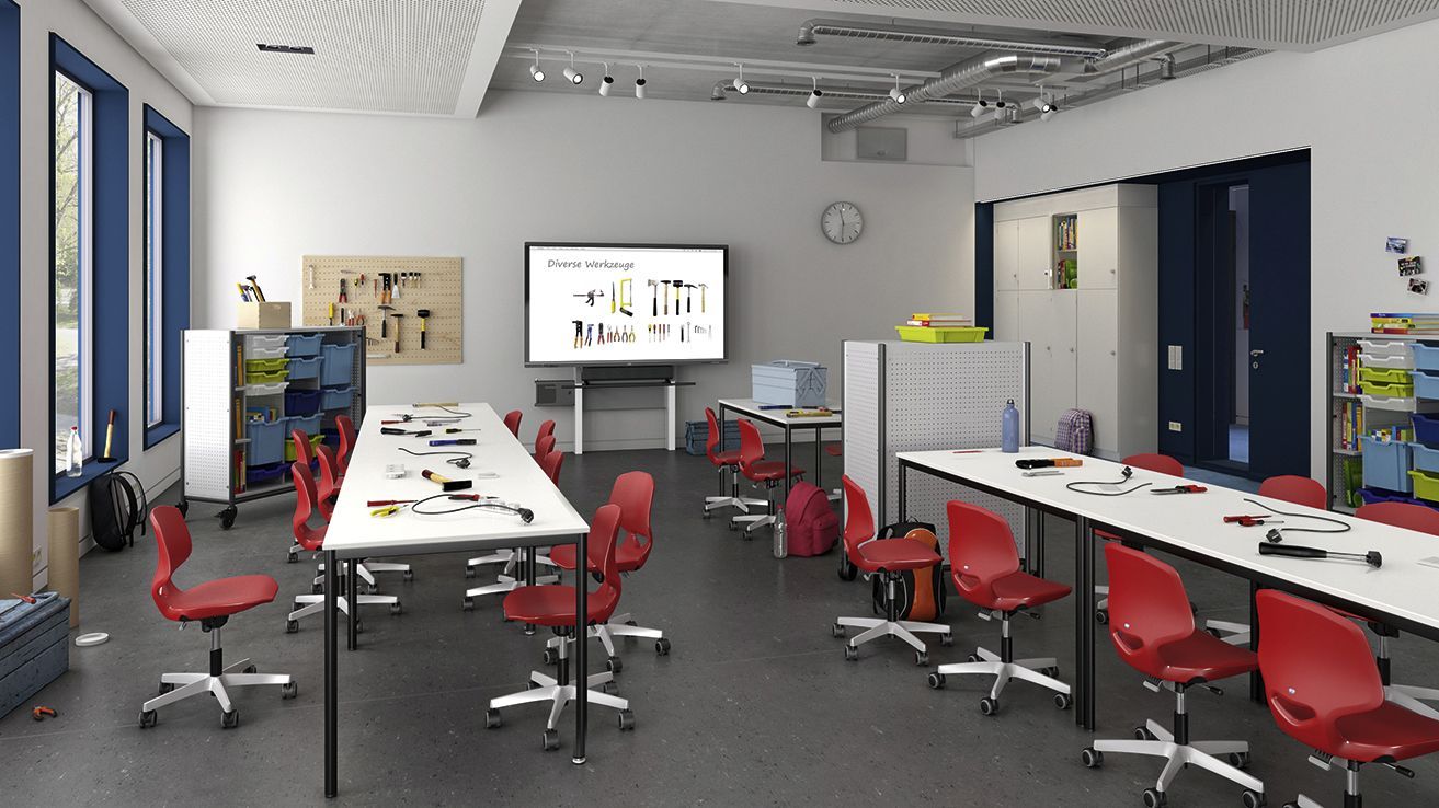 A classroom for tradespeople with JUMPER chairs and an interactive whiteboard by VS