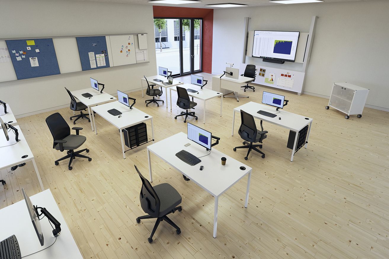 Student desks by VS with built-in PC holder, monitor arm and cable outlet in a computer room