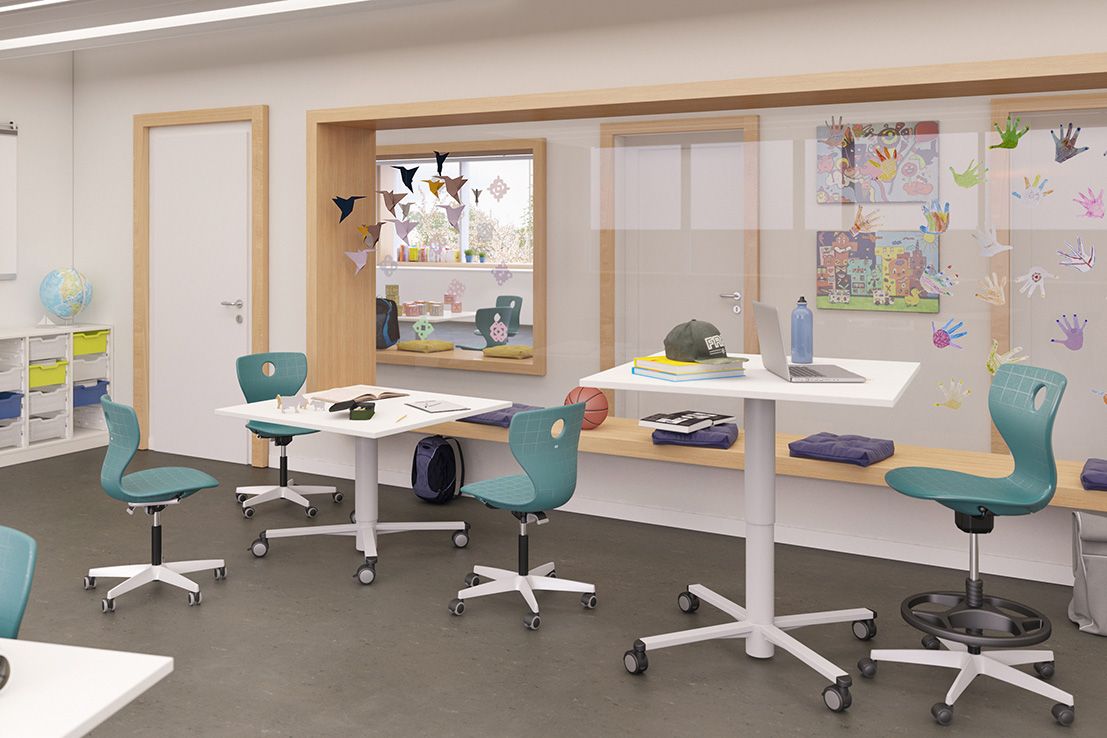 Classroom with PantoMove student swivel chairs, height-adjustable desks RondoLift and Gratnells box cabinets