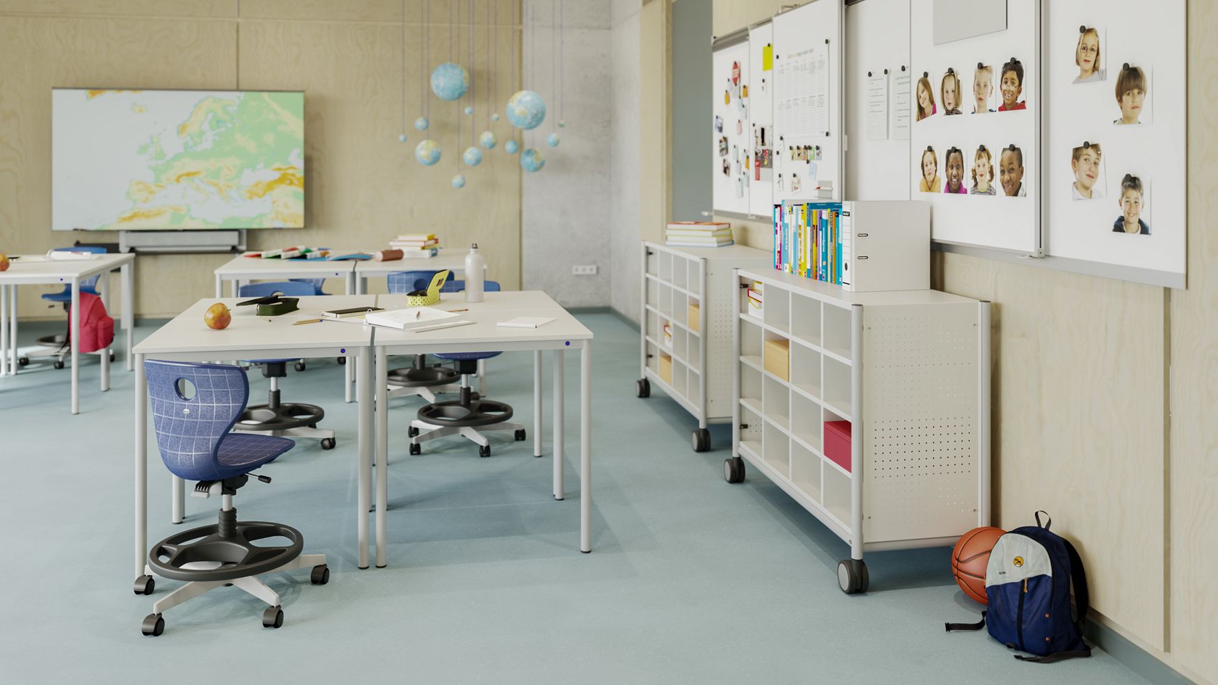 Classroom with free-form skid desks and height-adjustable student swivel chairs with footrest for all age groups