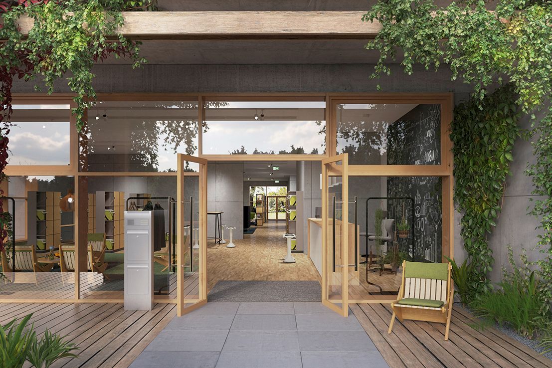 Eine Außenansicht eines hellen und modern eingerichteten Büros, in dem grünen Akzenten mit Neutra Boomerang Chairs, Hokkis und Begrünung gesetzt wurden.