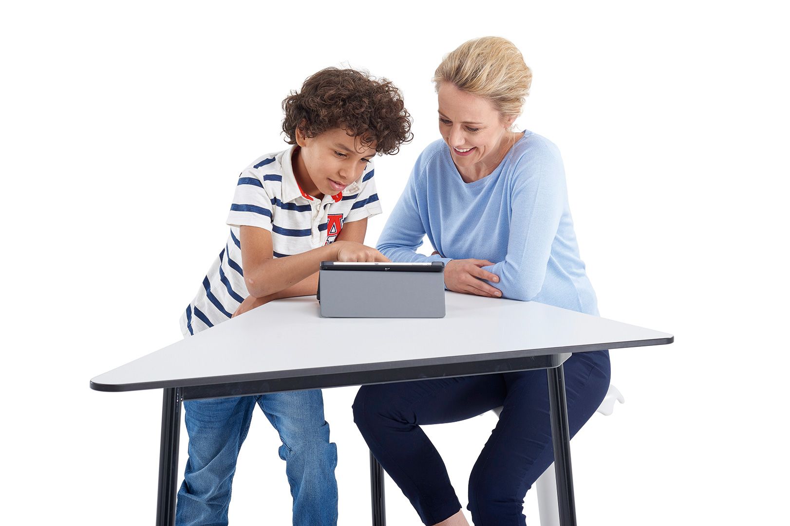 A woman and a boy at the VS standing table TriUnion