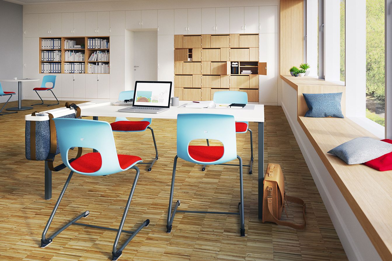 A work and break room with the upholstered cantilever chair NF-Swing by VS