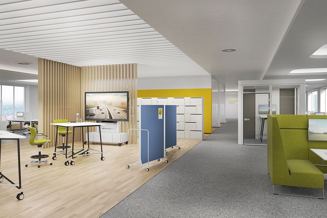 Eine offene Bürolandschaft mit Stehtischen TriUnion und Sitzecke HiBack der Serie Lounge von VS